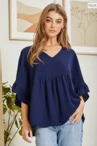 I LOVE good fall neutral tops! This top is so flowy & comfortable, just enough detail to dress up or down, and comes in two colors! It's the kind of top you want