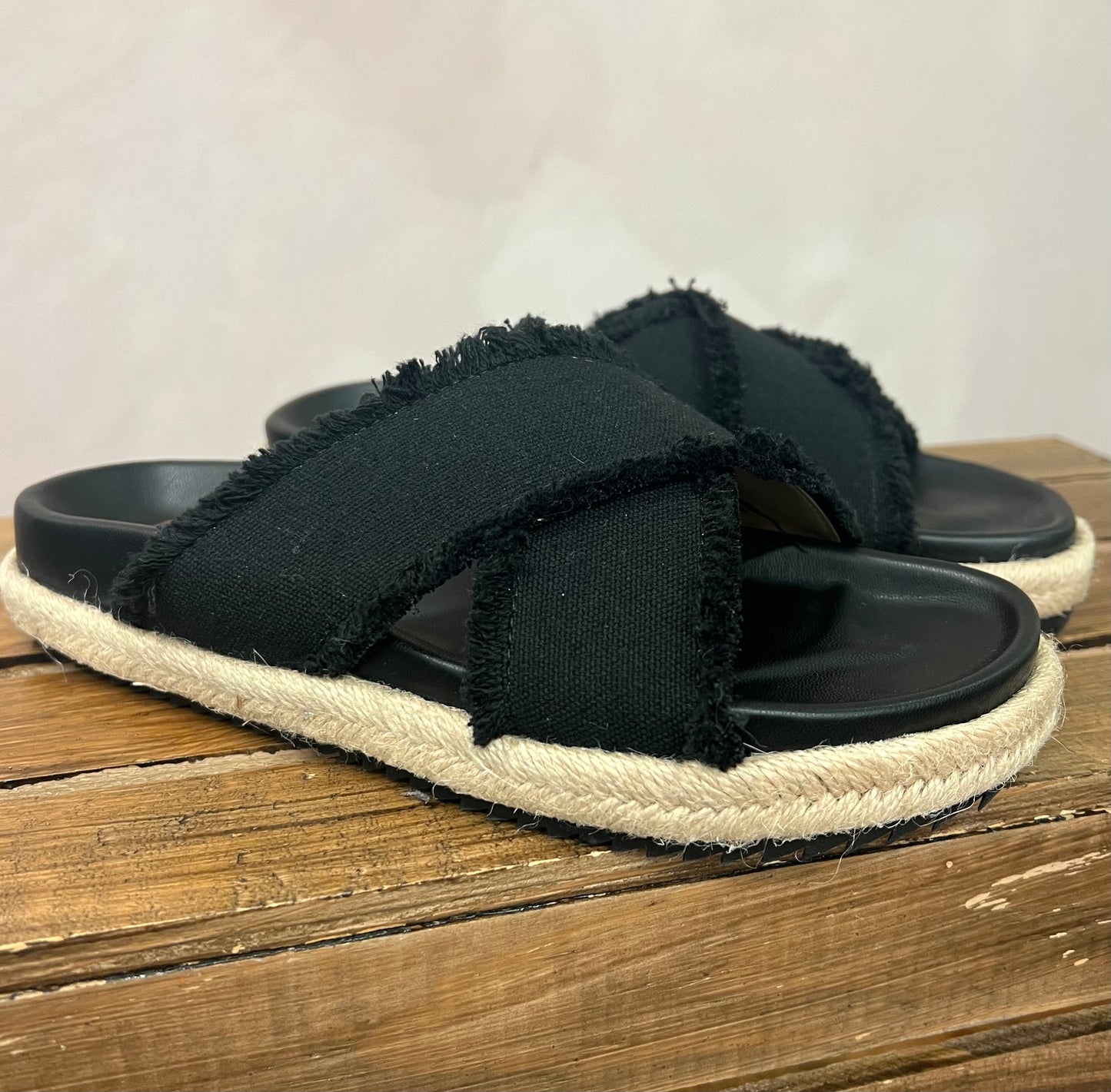 The quality of this sandal is SO GOOD! Very comfortable, supportive footbed, and such pretty neutral colors that go with anything! 
Sizing: These do run small! You m