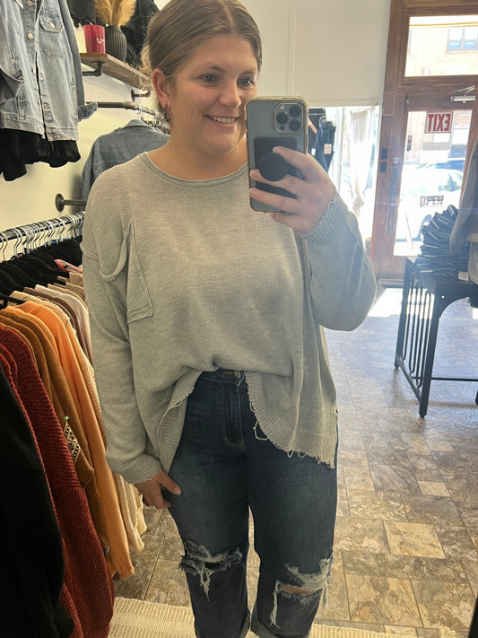 Slouchy sweaters are the way to go this season! This one is lightweight, flowy &amp; has a little distressing detail to give it that extra character! You’ll love thr